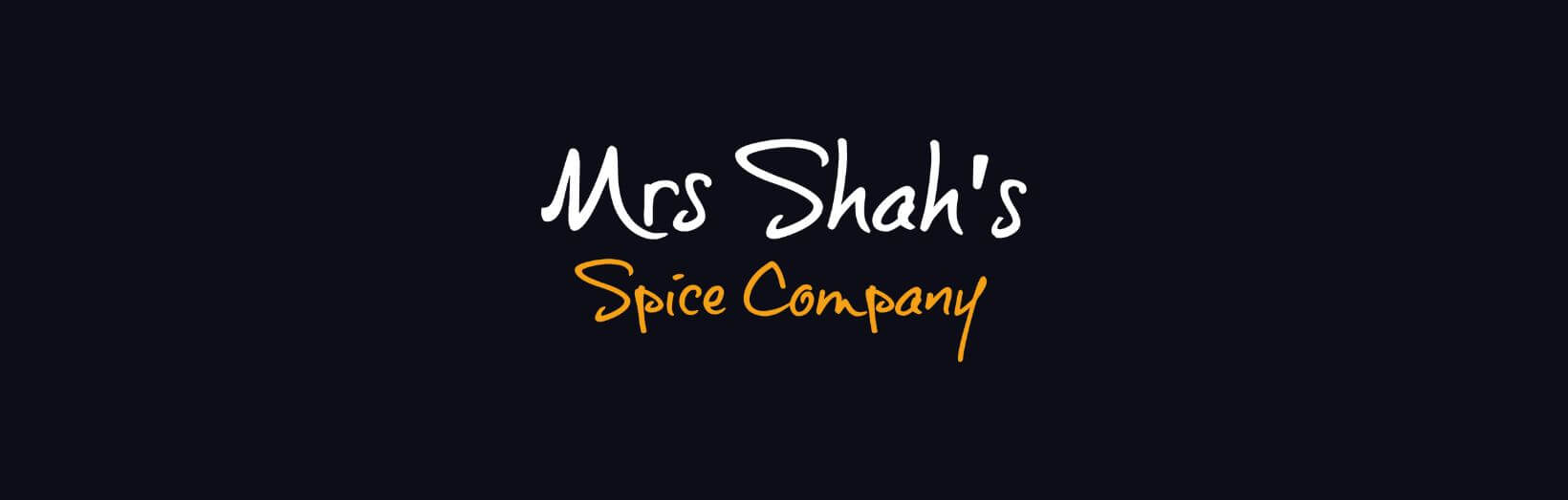 Logo of Mrs Shah's Spice Company featuring vibrant colors with elegant typography, symbolizing culinary excellence while reflecting the brand's heritage.